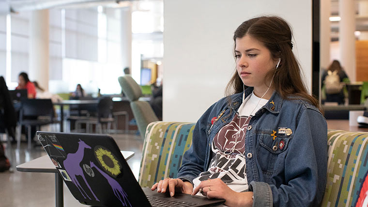 Student using laptop.