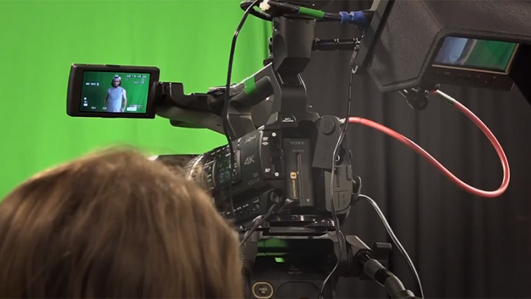 Filming on a green screen.